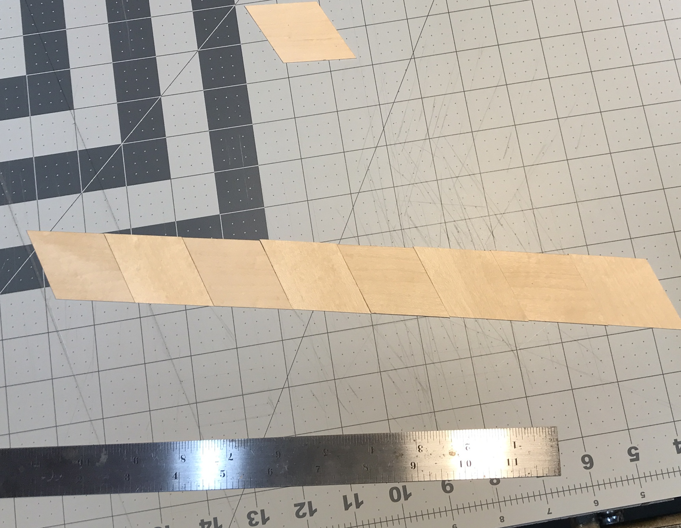 The separator strip laid out with alternating grain directions.